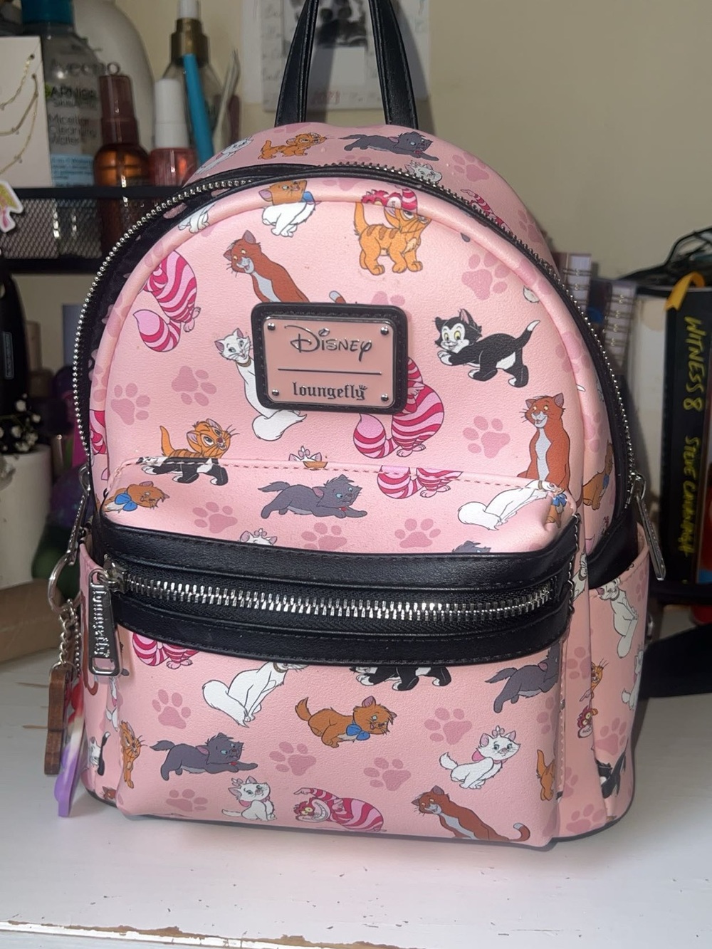 Loungefly Black Mini Backpack with Pink Paw Print Lining
